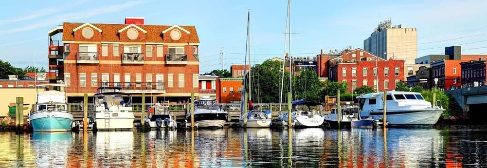 Scenic view of boats docked at Sono Seaport in South Norwalk - Proudly serving Norwalk since 1989.